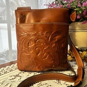 Patricia Nash Tooled Stipes Sling
Florence Crossbody NWOT